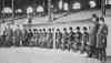 A group of policemen pose in the home team's dugout (Source: Boston Public Library)