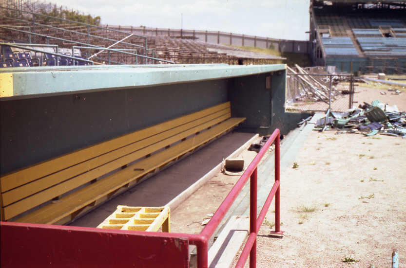 Abandoned: The third base (visitor) dugout with its original bat rack (Source: Robin Hanson)